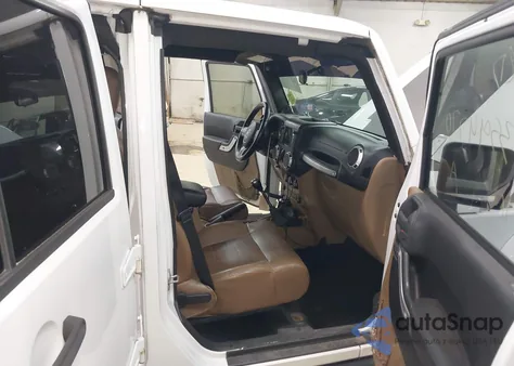 2011 Jeep Wrangler Unlimited Rubicon z USA, uszkodzony, nr VIN 1J4BA6H10BL580254